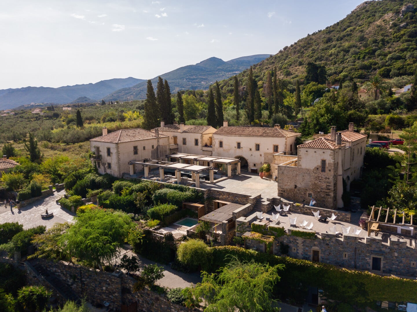 Aerial view of the main building of Kinsterna nestled in nature, a unique country hotel in Greece located in Monemvasia.