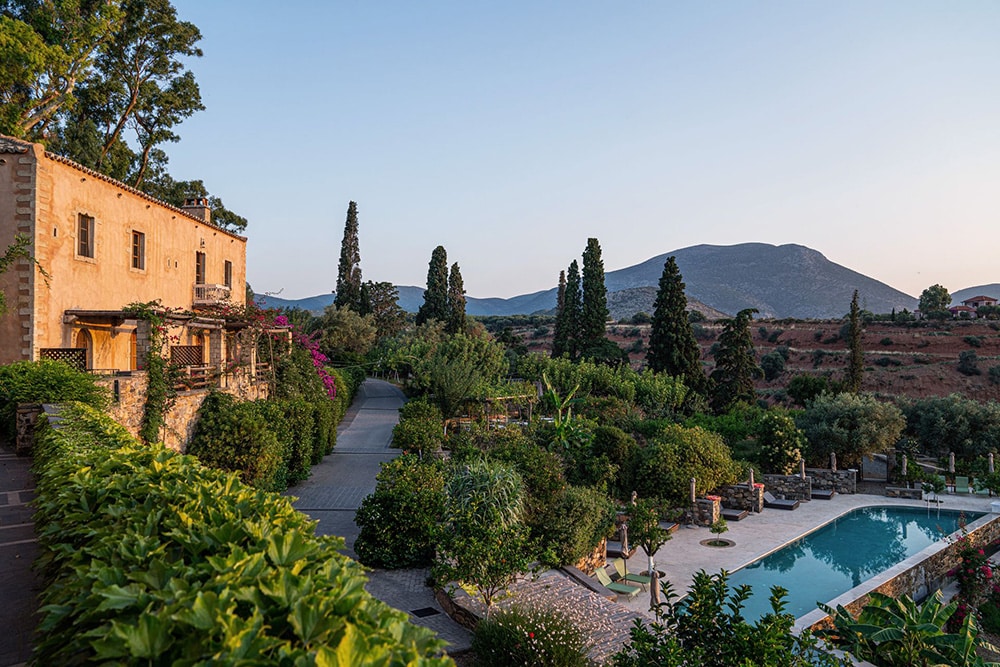 Kinsterna mansion awakening in the soft light of Spring, one of the greatest seasons to travel to Greece in April.  